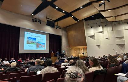 π― Town Meeting Votes Down Trash Carts