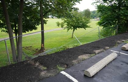 β A Car Crashed Through a Fence at Memorial Park