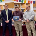 Brendan Manning with the members of the school committee in attendance and Superintendent Dr. Milaschewski