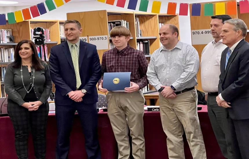 Brendan Manning with the members of the school committee in attendance and Superintendent Dr. Milaschewski