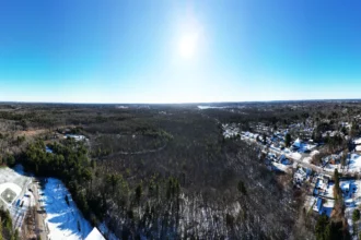 Aerial view showing the overall area of the Symond's Way property