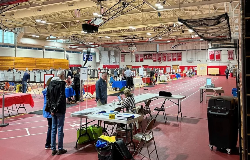 Voting takes place at the Hawkes Field House at Reading Memorial High School.