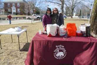 Kathy Kinney and Lisa Egan from the Chamber of Commerce setting up for Winterfest tonight.