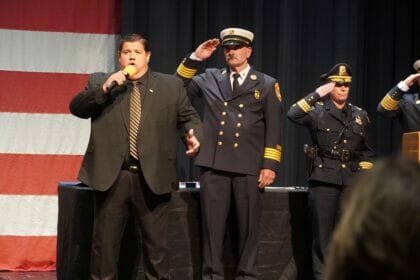 Todd Angilly of the Boston Bruins, sings the National Anthem