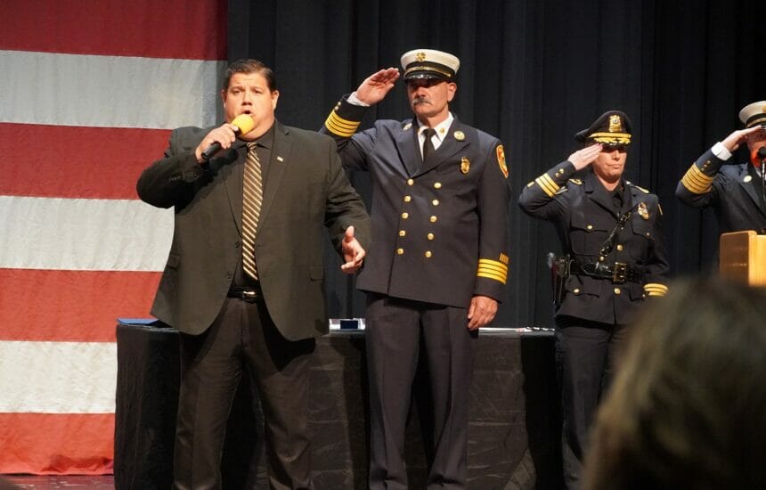 Todd Angilly of the Boston Bruins, sings the National Anthem