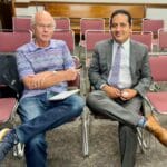 Bob Holmes of the Daily Times Chronicle (left) interviewing Fidel Maltez (right) after the meeting announcement tonight.