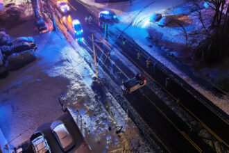 Main Street in ReadingMain Street in Reading, where a car struck a pole and flipped over. You can also see the large black Verizon wiring knocked down across the roadway.