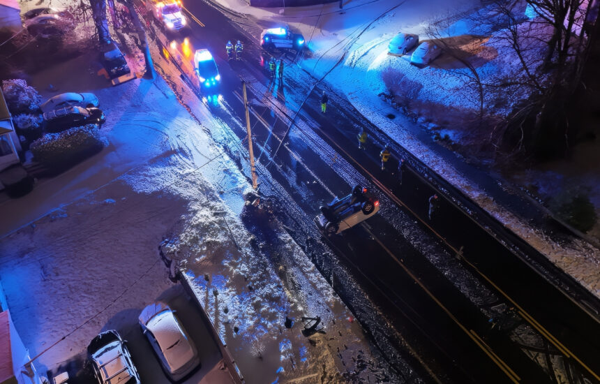 Main Street in ReadingMain Street in Reading, where a car struck a pole and flipped over. You can also see the large black Verizon wiring knocked down across the roadway.